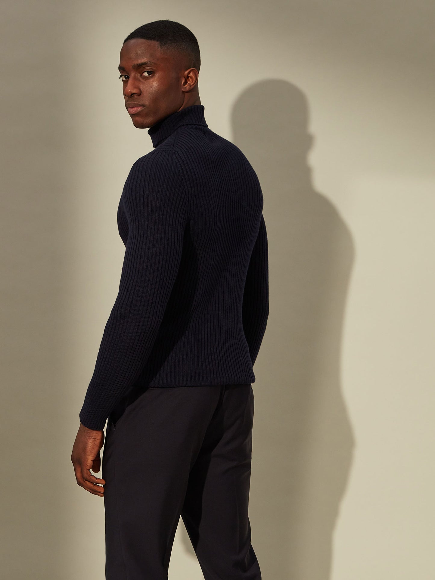 blue roll neck sweater, smart and comfortable for travel