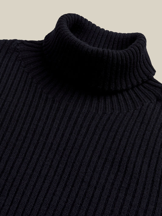 Soft blue knit jumper with roll neck